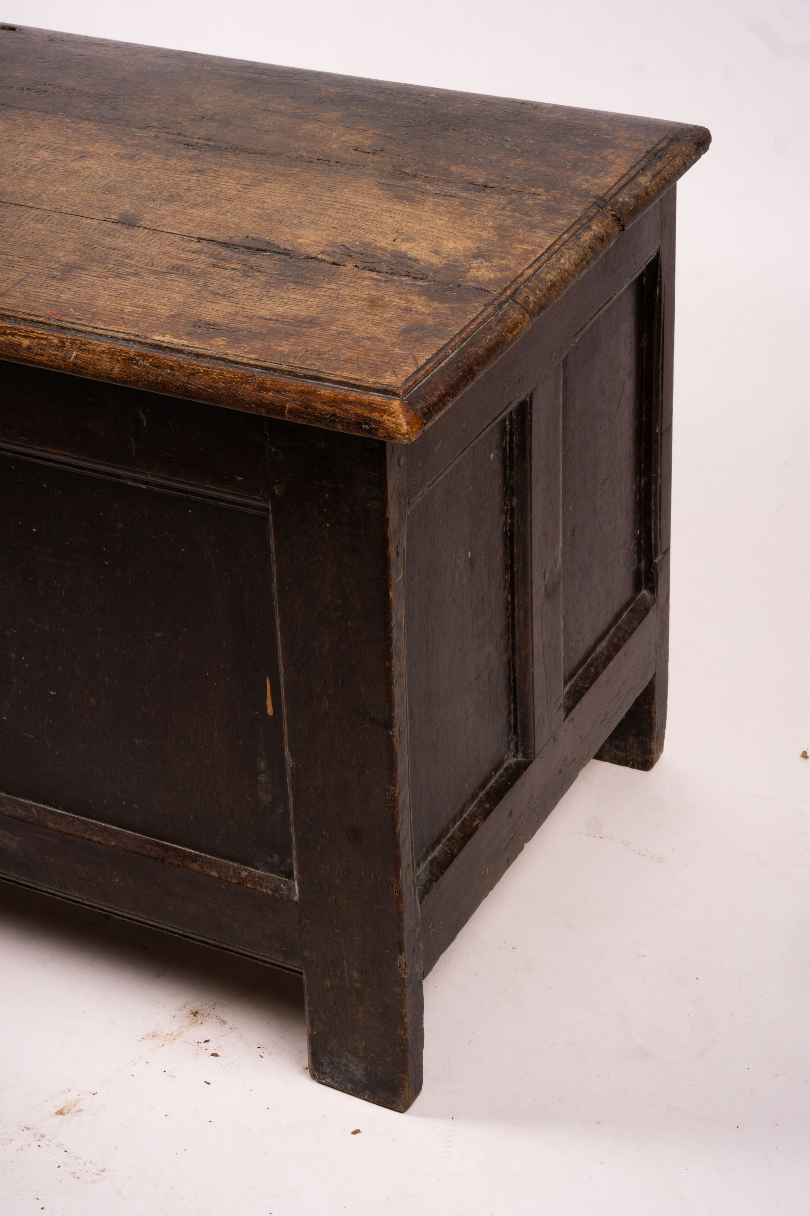 A 17th century panelled oak coffer, length 136cm, depth 56cm, height 64cm